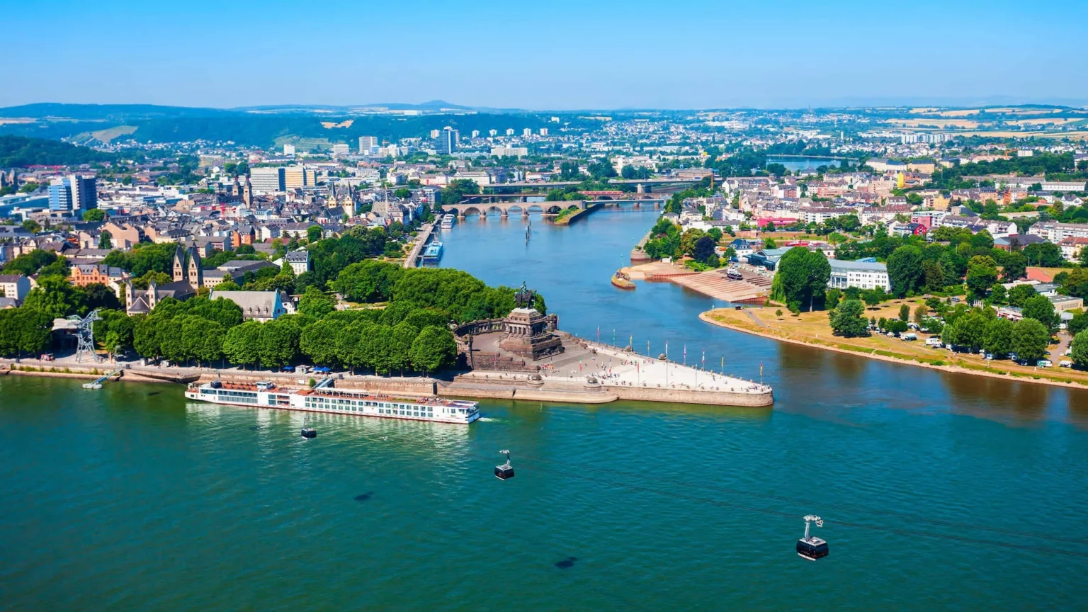 The Rhine and Moselle meeting at Koblenz, with river ships moored along the bank